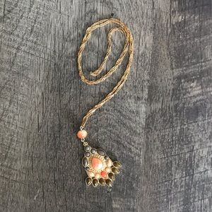 Gold pendent necklace